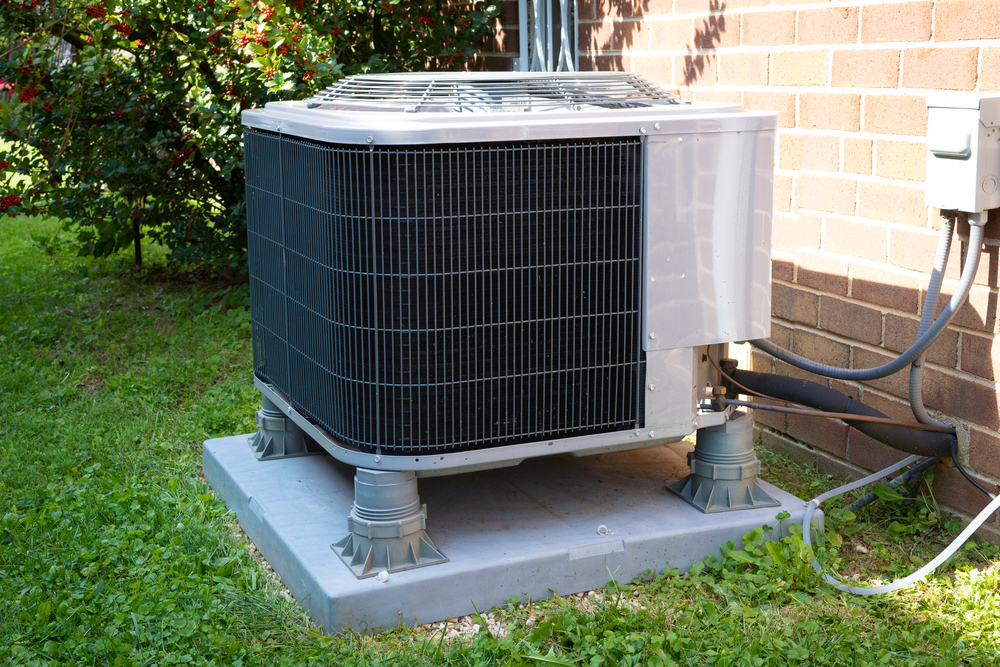 Hvac,air,conditioning,unit,on,concrete,slab,with,new,construction